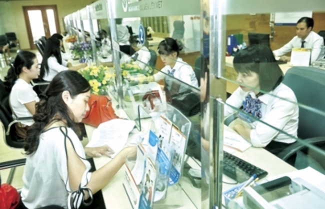 Lãi suất giảm, ngân hàng Việt dồi dào thanh khoản giữa “bão" tài chính quốc tế