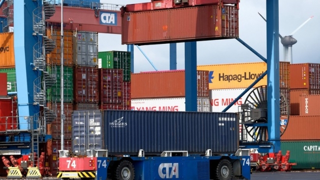 OECD điều chỉnh nâng dự báo tăng trưởng kinh tế toàn cầu