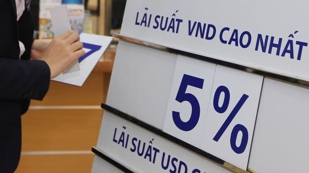 Lãi suất huy động nóng dần, dự báo mặt bằng lãi suất cho vay năm 2025