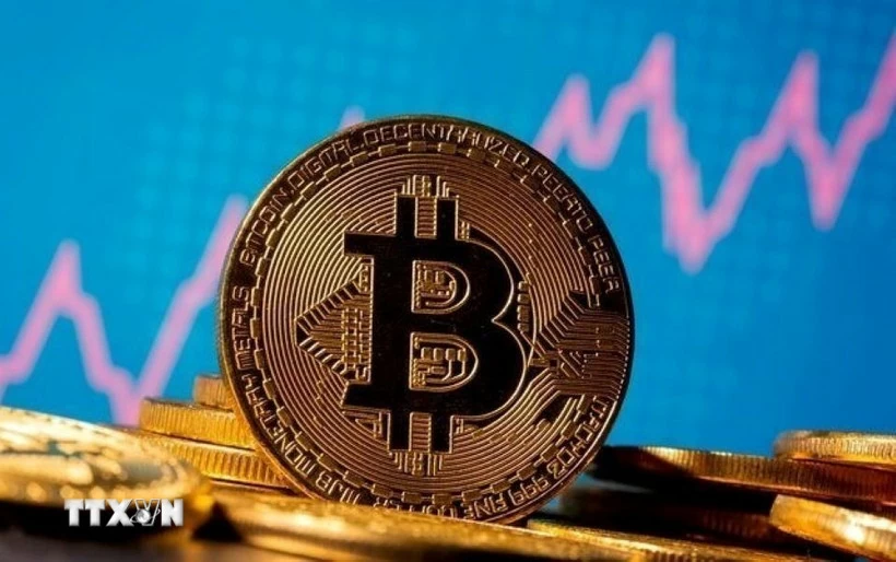 Bitcoin rơi khỏi mốc 90.000 USD lần đầu tiên trong 7 tháng Hình ảnh minh họa đồng tiền kỹ thuật số Bitcoin. (Nguồn: Reuters/TTXVN)